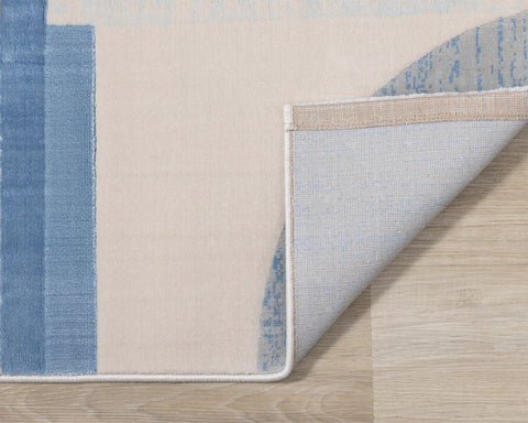 Belle Plush Rug - Blue / Grey Geometric Pattern corner flipped to show underside