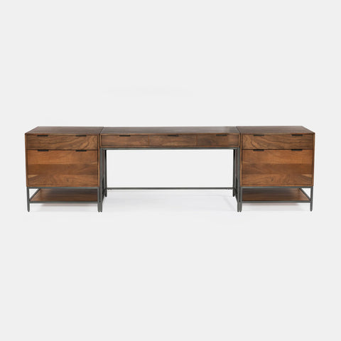 Solid acacia wood 3 piece desk in honey brown finish with industrial black metal frame. One filing cabinet on each end with desk in middle.