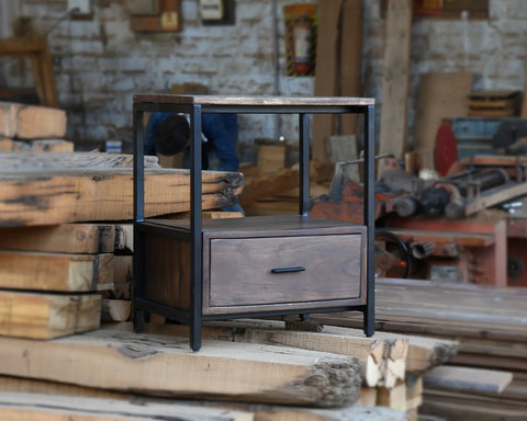 Solid acacia wood nightstand in honey brown finish with industrial black metal frame.