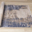 Chorus Plush Rug - Abstract Earth Blue / Beige roll on floor