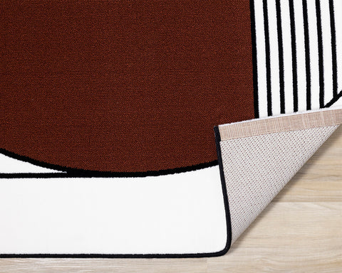 Claro Plush Rug - Art Déco Geometric corner flipped to show underside