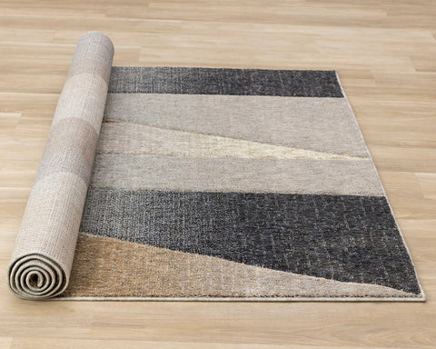 Cora Rug - Geometric Black Brown roll on floor