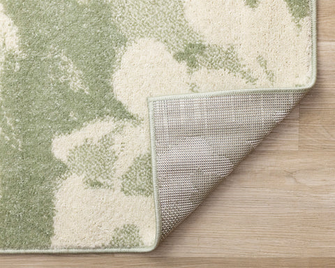 Eclipse Rug - Floral Green corner flipped to show underside