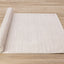 Ellington Rug - Subtle Diamond Pattern roll on floor