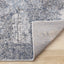 Emory Distressed Rug - Grey corner flipped to show underside