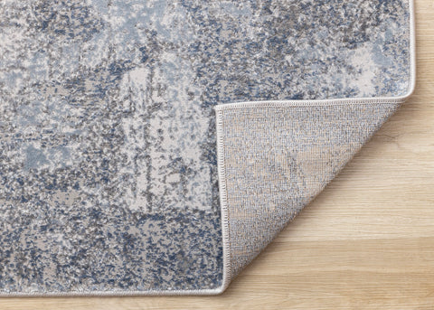 Emory Distressed Rug - Grey corner flipped to show underside
