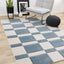 Folio Rug - Blue & White Banded in living room setting