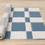 Folio Rug - Blue & White Banded roll on floor