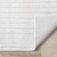 Hayden Rug - Light Cream Modern Lines corner flipped to show underside