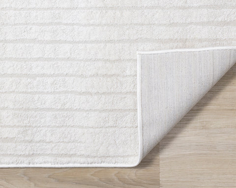 Hayden Rug - Light Cream Modern Lines corner flipped to show underside