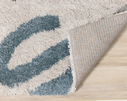 Kids Shag Rug - Doodles corner flipped to show underside