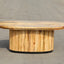 Solid mango wood oblong coffee table with repeating pattern ribbing base in natural finish.