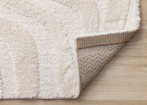 Luxe Rug - White Curvy Lines corner flipped to show underside
