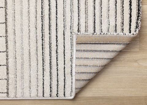 Mae Rug - White Black Intricate Lines corner flipped to show underside