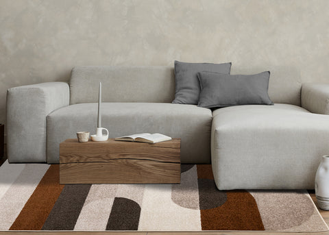 Malibu Rug - Curvy Geometric Taupe Oxblood in living room setting