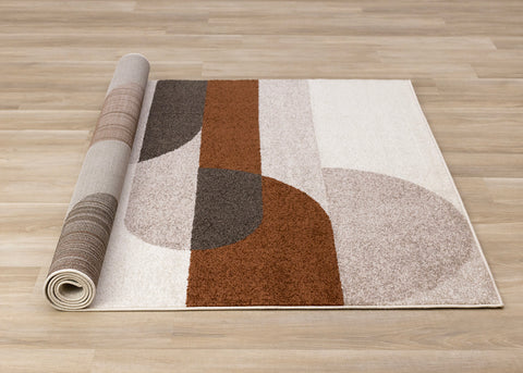 Malibu Rug - Curvy Geometric Taupe Oxblood roll on floor