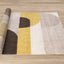 Malibu Rug - Curvy Geometric Taupe Yellow roll on floor