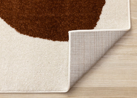 Malibu Rug - Pebbles corner flipped to show underside