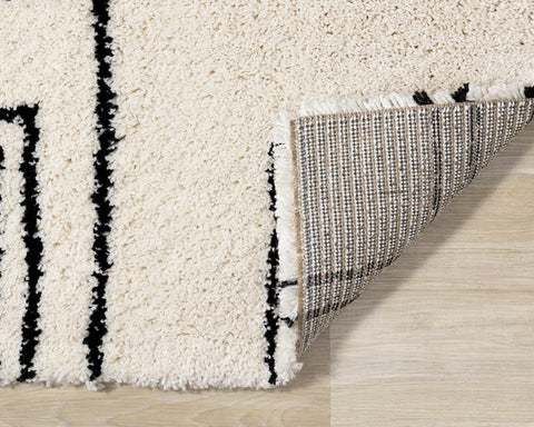 Maroq Shag Rug - Blocky corner flipped to show underside