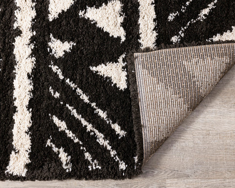 Maroq Shag Rug - Black Peaks corner flipped to show underside