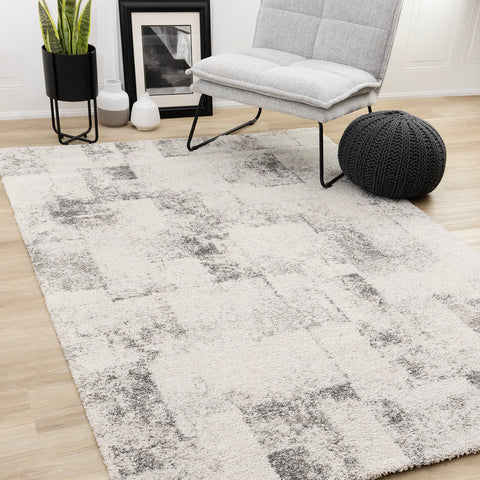 Marquis Distressed Rug - White Grey Patches in living room setting