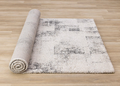 Marquis Distressed Rug - White Grey Patches roll on floor