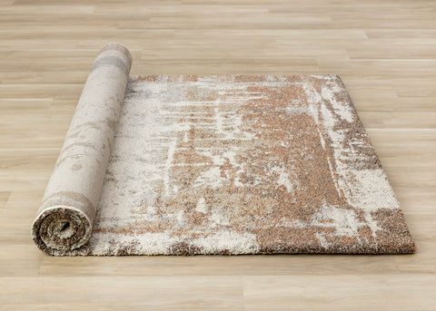 Marquis Distressed Rug - Orange Cream roll on floor