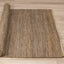 Naturals Rug - Braided Jute roll on floor