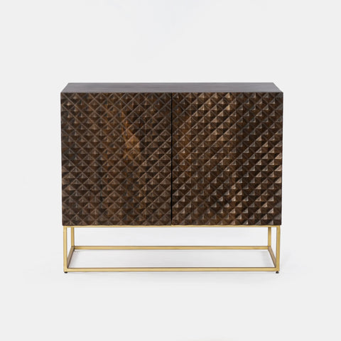 Dark brown mango wood sideboard with a CNC carved repeating pyramid pattern on the two doors. Brass finished iron legs & frame.