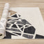 Samira Rug - Shattered Glass roll on floor