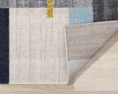 Sara Rug - Bold Stripes corner flipped to show underside