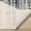 Serene Distressed Rug - Curvy Shapes corner flipped to show underside