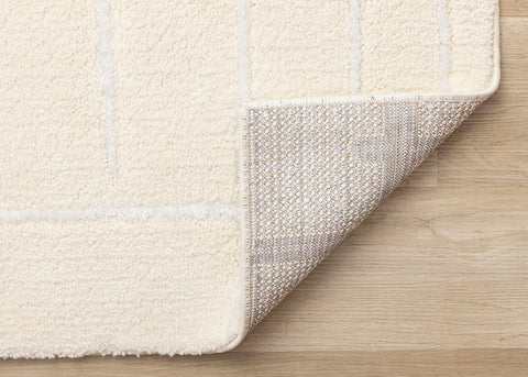 Sully Rug - Cream Broken Lines corner flipped to show underside
