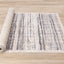 Swift Rug - Cream Taupe Distressed Lines roll on floor