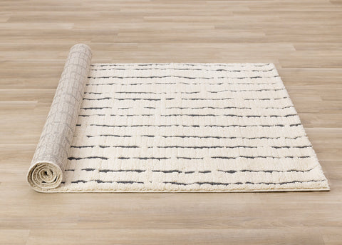 Talia Rug - Black Rain roll on floor