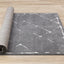 Talia Rug - Black Broken Lattice roll on floor