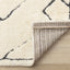 Talia Rug - White Broken Lattice corner flipped to show underside