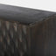 Solid mango wood sideboard in grey finish with golden iron legs in mid-century style. CNC carved detailed doors. Corner detail.
