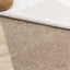 Anti-slip Rug Underpad with rug above to show its properties