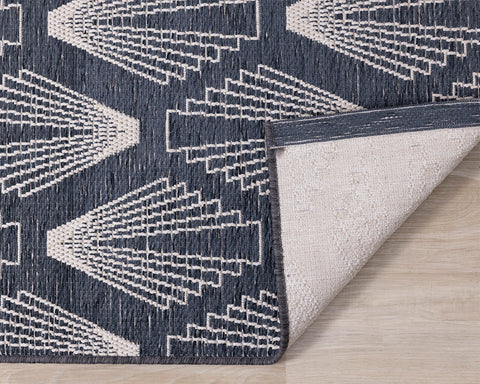 Vista Indoor / Outdoor Rug - Shells corner flipped to show underside