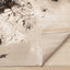 Zola Distressed Rug - Foliage corner flipped to show underside