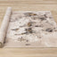 Zola Distressed Rug - Foliage roll on floor