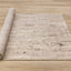 Zola Distressed Rug - Beige Cream roll on floor