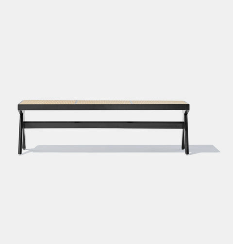 Solid black stained ash wood bench with solid frame and woven natural rattan seat.